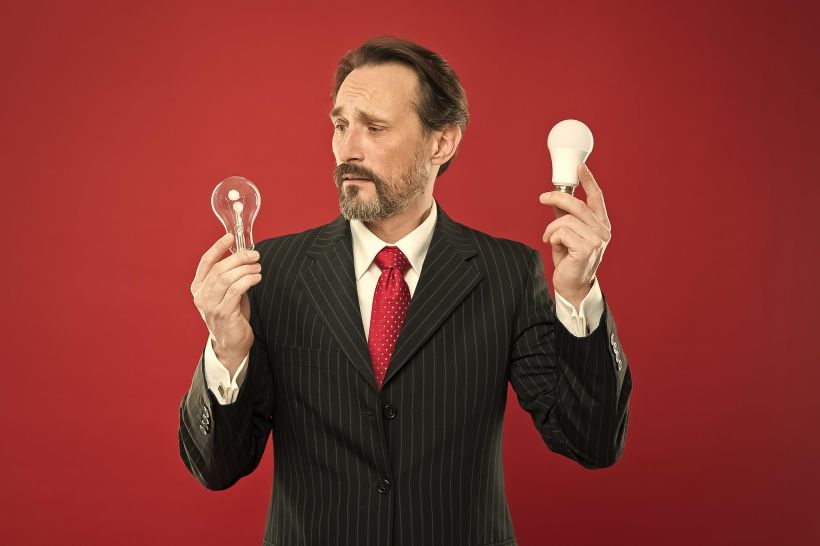 He got an idea confused male in business outfit with beard search for inspiration.