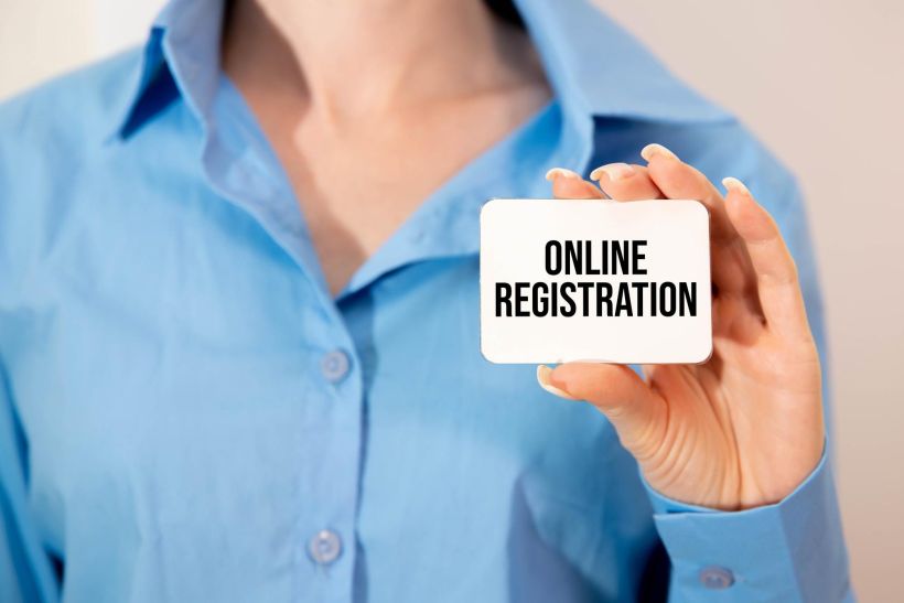 Online registration on the paper isolated on it desk business and inspiration concept.