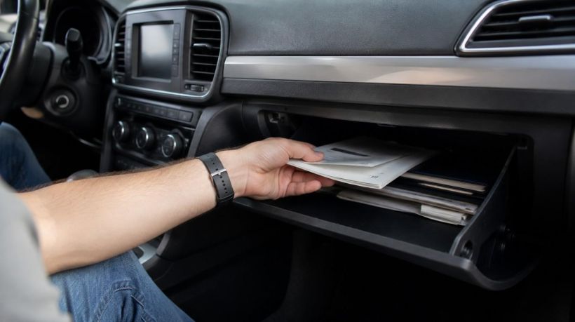 Storing proof of registration in the glovebox in case your California replacement sticker never arrived